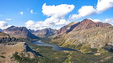 View of Two Medicine Lake, mountain peaks Rising Wolf Mountain and Sinopah Mountain, hiking trail to Scenic Point, Glacier National Park, Montana, USA, North America