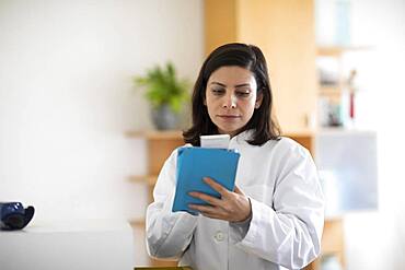 Pharmacist working with medicine in a pharmacy, Germany, Europe