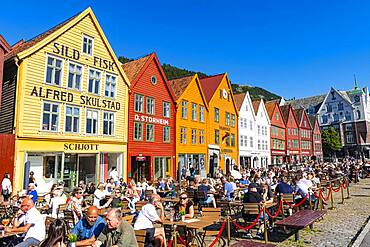 Open air cafes, Bryggen, series of Hnaseatic buildings, Unesco world heritage site, Bergen, Norway, Europe