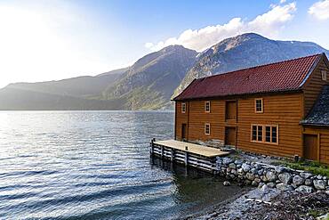 Boatshouse in the harbour of Eidfjord village, Eidfjord, Vestland, Norway, Europe