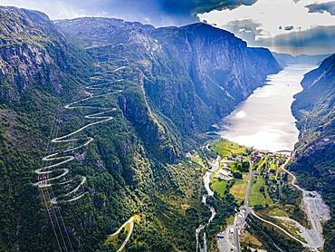 Zigzag road leading down to Lysebodn, at trhe end of Lystrefjord, Norway, Europe