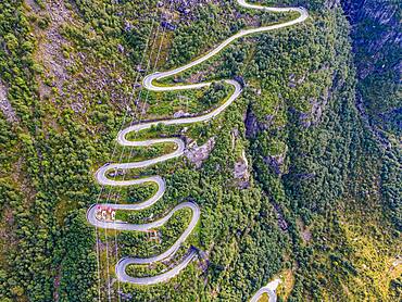 Zigzag road leading down to Lysebodn, at trhe end of Lystrefjord, Norway, Europe