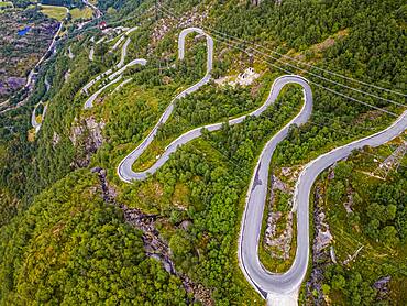 Zigzag road leading down to Lysebodn, at trhe end of Lystrefjord, Norway, Europe