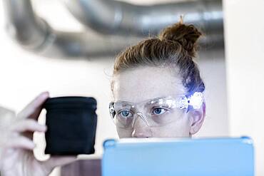 Young logistician working with scan glasses, Freiburg, Baden-Wuerttemberg, Germany, Europe