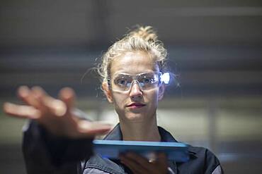 Young logistician working with scan glasses, Freiburg, Baden-Wuerttemberg, Germany, Europe