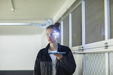 Young logistician working with scan glasses, Freiburg, Baden-Wuerttemberg, Germany, Europe