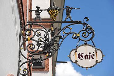 Old nose sign with golden grape, cafe, Bad Toelz, Upper Bavaria, Bavaria, Germany, Europe