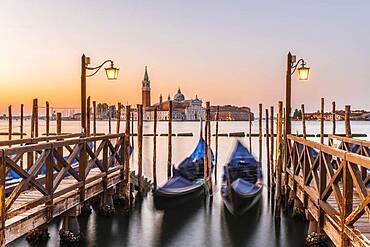 Venetian gondolas, behind church San Giorgio Maggiore, dawn, Venice, Veneto, Italy, Europe