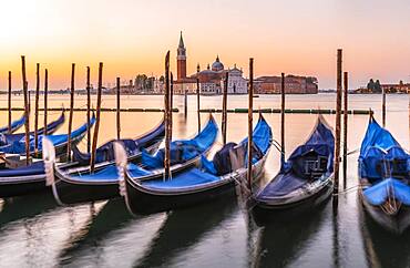 Venetian gondolas, behind church San Giorgio Maggiore, dawn, Venice, Veneto, Italy, Europe