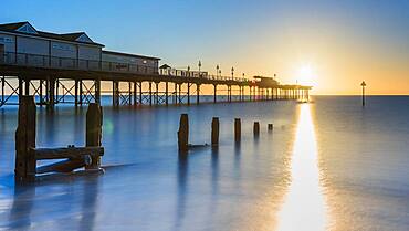 Sunrise in long time exposure of Grand Pier, Teignmouth, Devon, England, United Kingdom, Europe