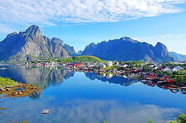 Silent fjord and mountains, Rorbuer, typical wooden houses, Reine, Reinefjord with mountains, Lofoten, Nordland, Norway, Europe