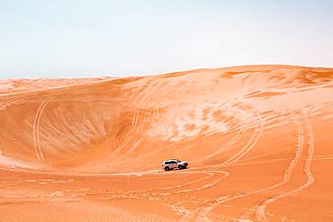 SUV in the desert, Wahiba Sands, Sultanate Of Oman