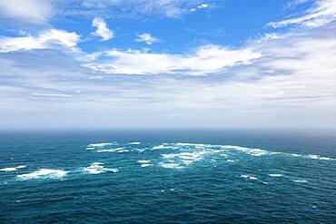 The Tasman Sea (left) meets the Pacific Ocean (right), Cape Reinga, Te Rerenga Wairua, Northland, North Island, New Zealand, Oceania