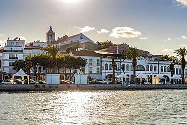 Old architecture facing wide river in historic Lagos, Algarve, Portugal, Europe