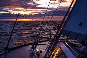 North Sea sailing on a half-tonner at sunset