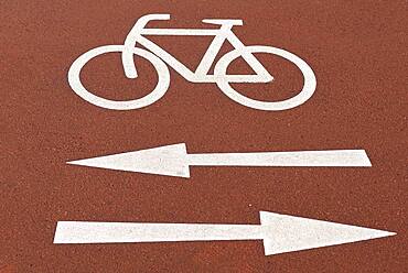 Red bike path with markings, Bavaria, Germany, Europe