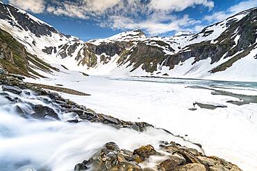 Mountain lake, partly frozen, Grossglockner High Alpine Road, Hohe Tauern National Park, Carinthia, Austria, Europe