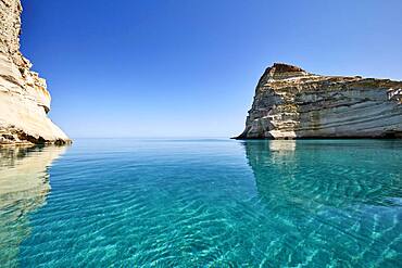 Crystal clear turquoise water and mighty rock formations, Kleftiko, Milos, Cyclades, Greece, Europe