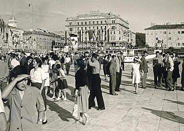 Yugoslavia in 1959: People at the harbour of Rijeka, in the back building of the shipping company Transjug, Adriatic Sea, Croatia, Europe