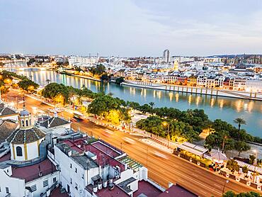 Aerial view of historic part with the river in Seville by the evening, Andalusia, Spain, Europe