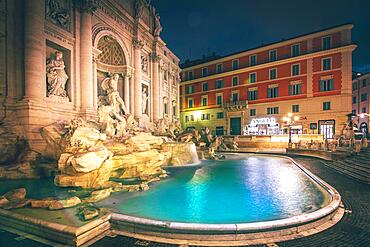 Illuminated fountain at night, with historical building, Trevi Fountain, Rome, Italy, Europe