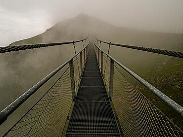 Suspension bridge in the fog, Stubnerkogel, Bad Gastein, Salzburger Land, Austria, Europe