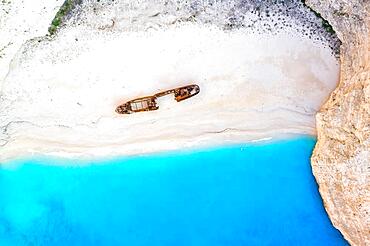 Beach shipwreck Navagio Beach drone shot bird's eye view in Zakynthos, Greece, Europe