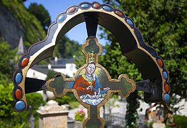 Wrought-iron grave cross in St. Peter's cemetery, cemetery of St. Peter's Abbey, Salzburg, Austria, Europe