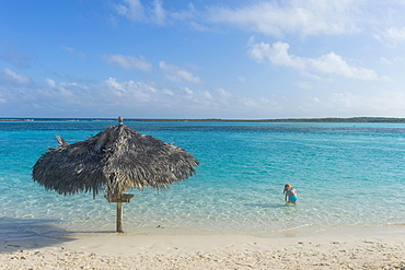 Turquoise waters and a white sand beach, Exumas, Bahamas, Caribbean, Central America