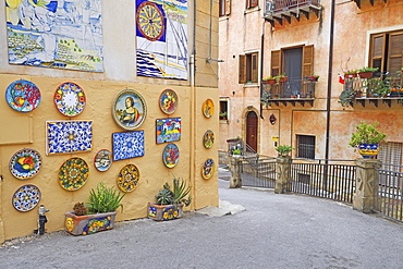 Typical alley decorated with ceramic art, Sciacca, Sicily, Italy, Europe