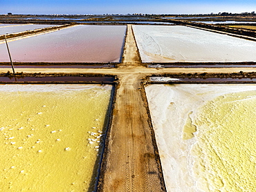 Amazing colors of sea salt ponds called salines shortly before salt extraction in Portugal