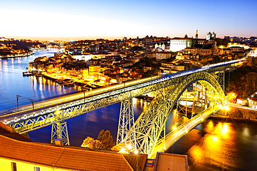 Porto with bridge Ponte Dom Luis I over river Douro night evening travel city in Porto, Portugal, Europe