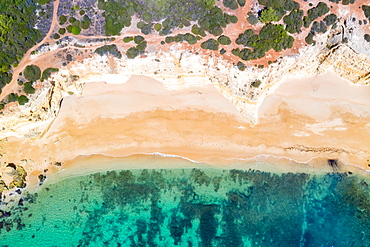 Portugal Algarve beach Praia da Marinha sea ocean drone shot from above in Praia da Marinha, Portugal, Europe