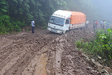 Truck stuck in mud on Ruta 3 in fog, Yungas, near Caranavi, La Paz Department, Bolivia, South America