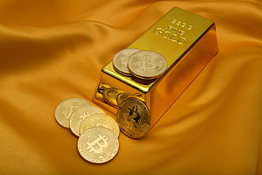 Gold bar fine gold fineness 999.9 and Bitcoin cryptocurrency, Baden-Wuerttemberg, Germany, Europe