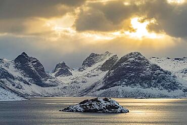 Winter Scandinavian landscape by the fjord, sea, mountains, snow, Ramberg, Nordland, Lofoten, Norway, Europe