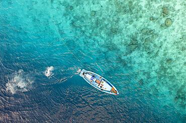 Aerial view, small fishing boat on a reef, Laviyani Atoll, Maldives, Indian Ocean, Asia