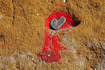 Stone as heart symbol in rocks with red colour, heart shape, symbol of love, sign of love, love symbol, heart of nature, natural heart, proof of love, heart symbol, organ heart, kindness, affection, inflamed, in love, crush, colour red, heart emoji, Spain, Europe