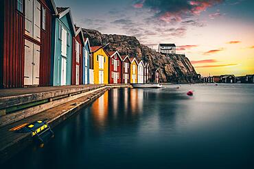 Boats and colourful boathouses in the harbour of Smoegen, Smoegenbryggan, Vaestra Goetalands Laen, Bohuslaen, Schwedena