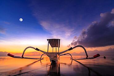 Outrigger boat, Jukung, on the beach and sunrise, Sanur Beach, Bali, Indonesia, Asia