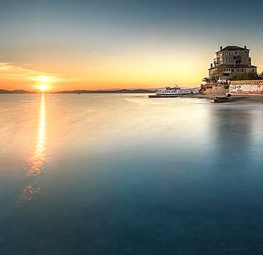 Fortified defence tower in Ouranoupoli, long exposure, sunset, overlooking the sea, Athos, Chalkidiki, Greece, Europe