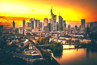 View over Frankfurt, view into the sunset with backlight, in the evening, the river Main and the skyline with its skyscrapers and streets taken from the Lindner Hotel, Hesse, Germany, Europe