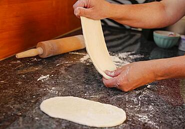 Swabian cuisine, preparation Hohenloher Blootz, Blooz, salty yeast pastry, men's hands, Germany, Europe