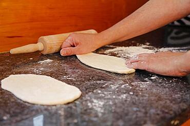 Swabian cuisine, preparation Hohenloher Blootz, Blooz, salty yeast pastry, men's hands, Germany, Europe