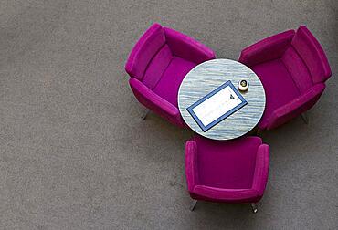 Arrangement of coloured club chairs in the restaurant, Berlin, Germany, Europe