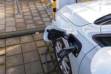 A car charges electricity, e-charging station, Magdeburg, Saxony-Anhalt, Germany, Europe