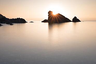 Sunrise at the rocks scoglio della galeazza, Imperia, Liguria, Italy, Europe