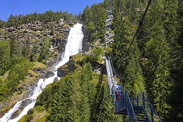 Hiking trail over a suspension bridge along the Stuibenfall near Umhausen, Oetztal, Tyrol, Austria, Europe