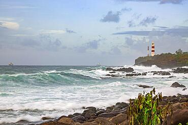 Wave crashing on the rock at Albion rocky beach on the west of the island of Mauritius