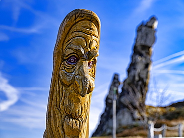 Carved wooden figure at the Devil's Wall rock formation near Weddersleben, Harz Mountains, Saxony-Anhalt, Germany, Europe